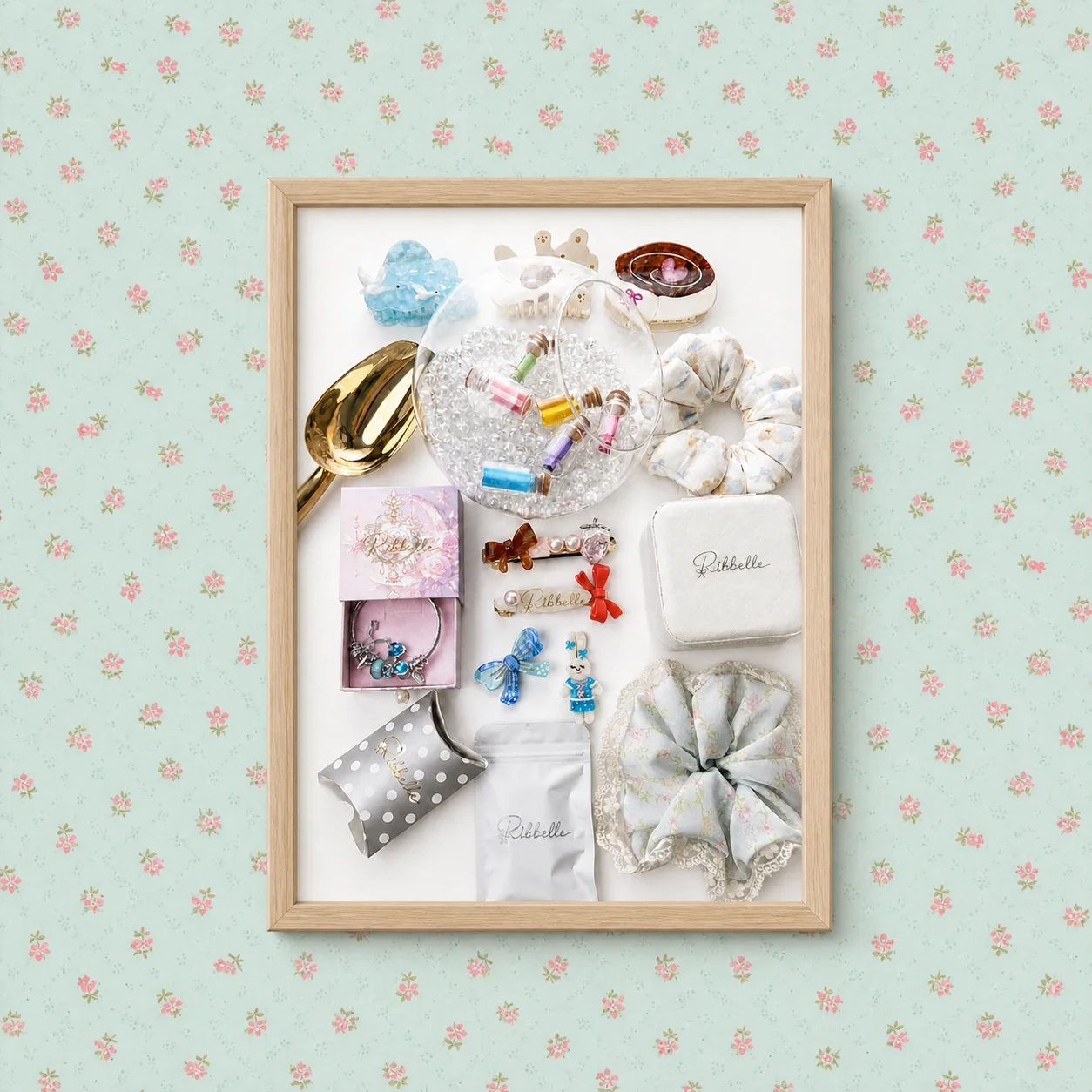 The Grand Scoop — framed flat-lay of clips, scrunchies, charms and jewelry